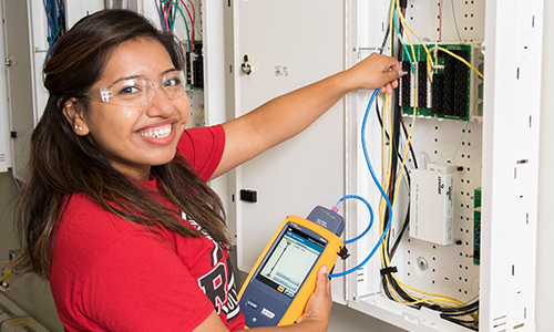 Student with electrical systems