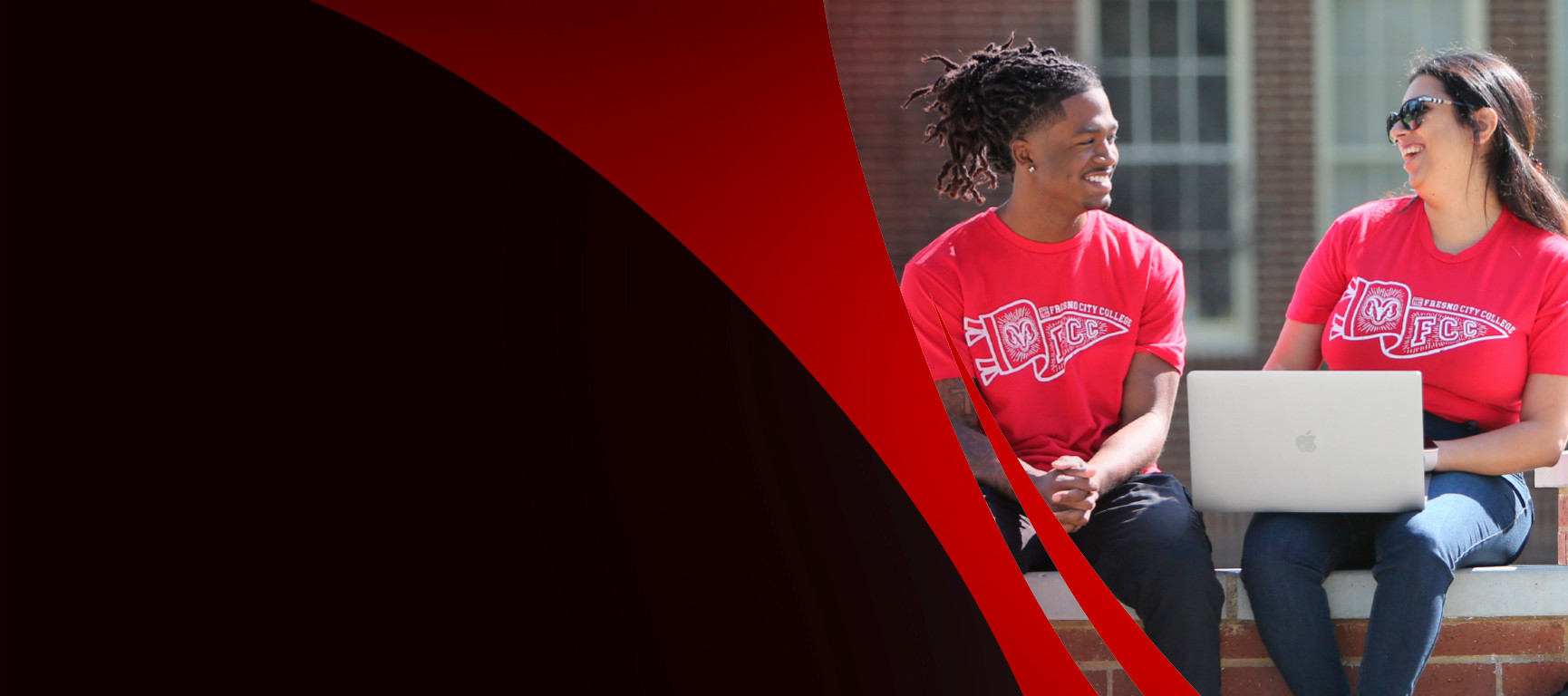 Two students chatting and laughing