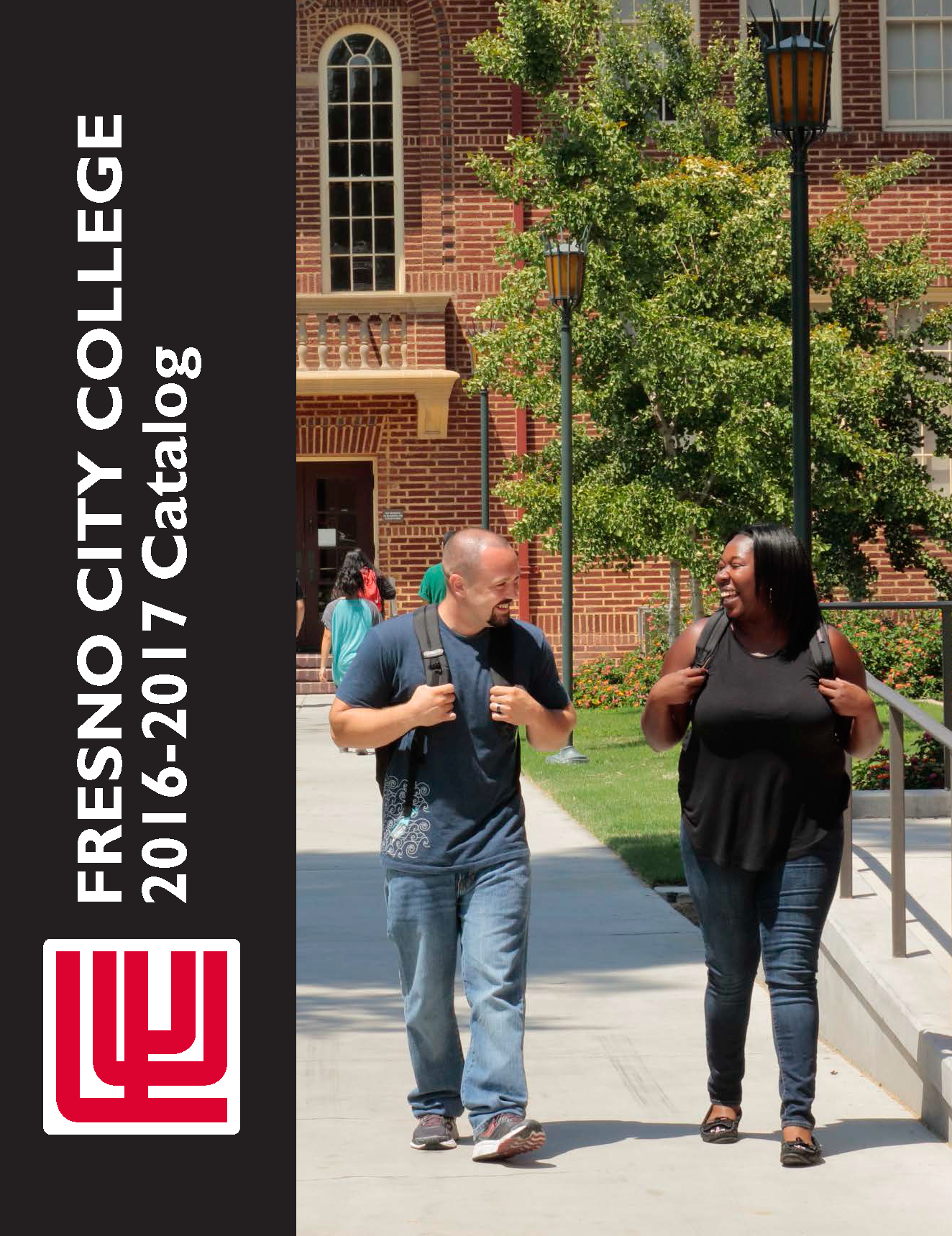 Two students walking in front of the OAB