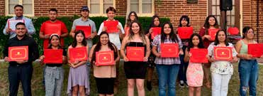 Students holding certificates