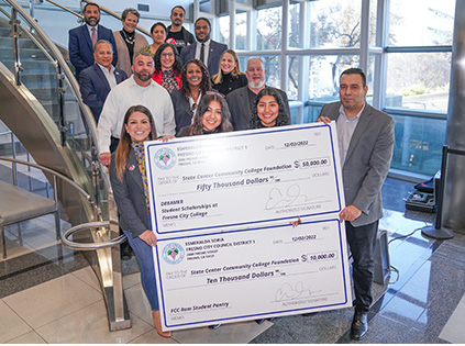 Group with giant check