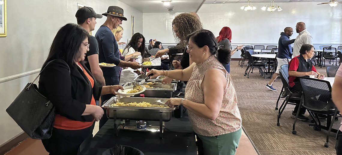 Employees in line at the buffet