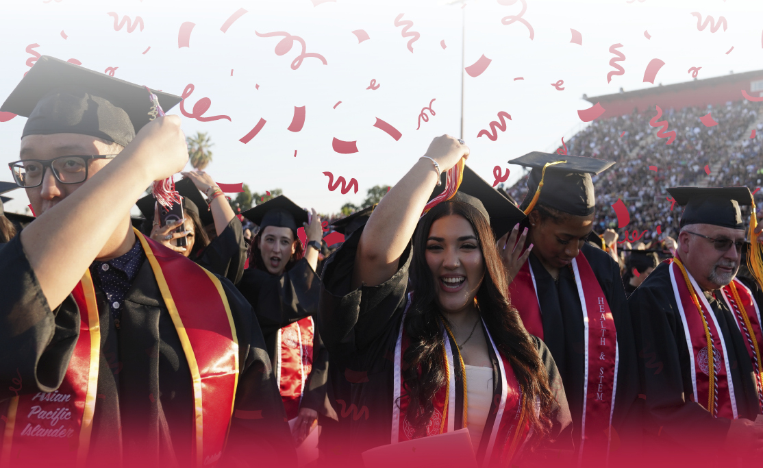 students celebrating at commencement