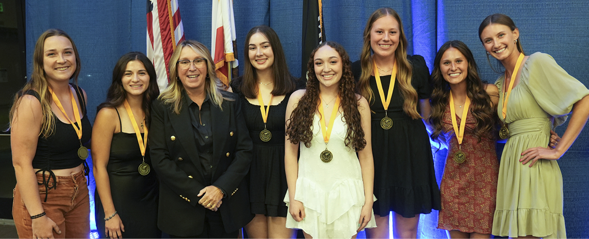Several athletics wearing award
