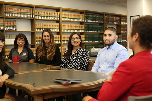 Students sitting around a table