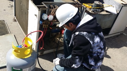      Student practices copper brazing 