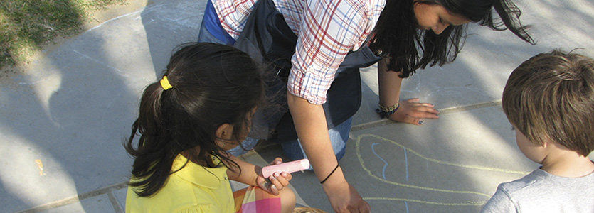 teacher working with preschool children