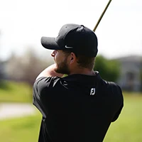 Golfer Swinging