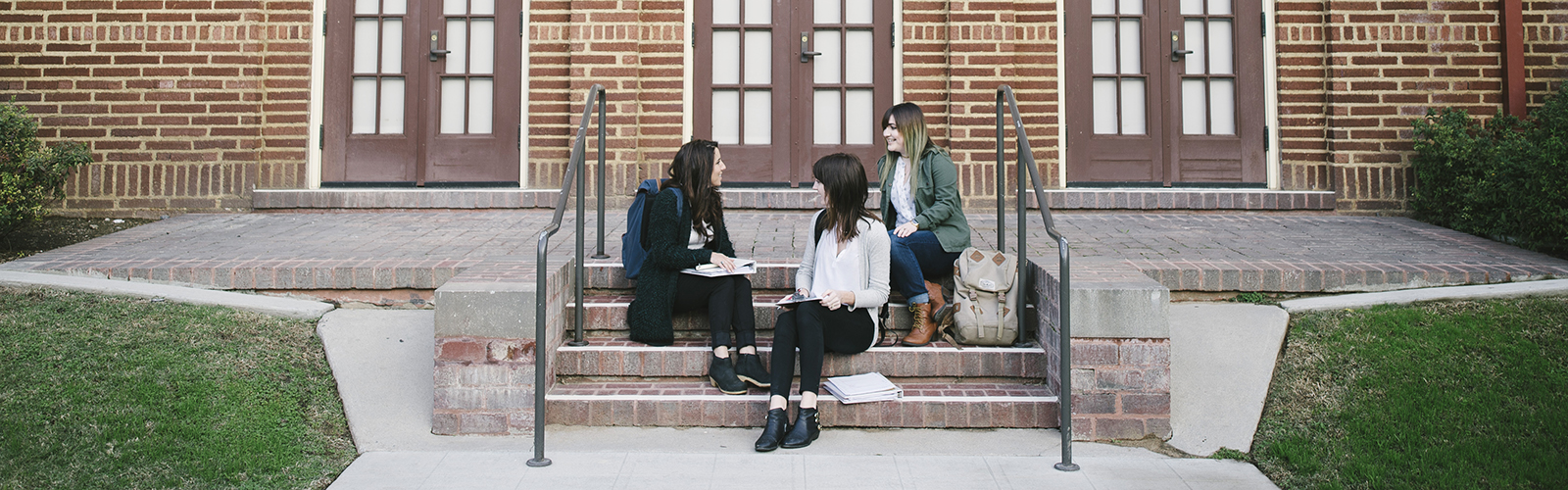 Students sitting on steps