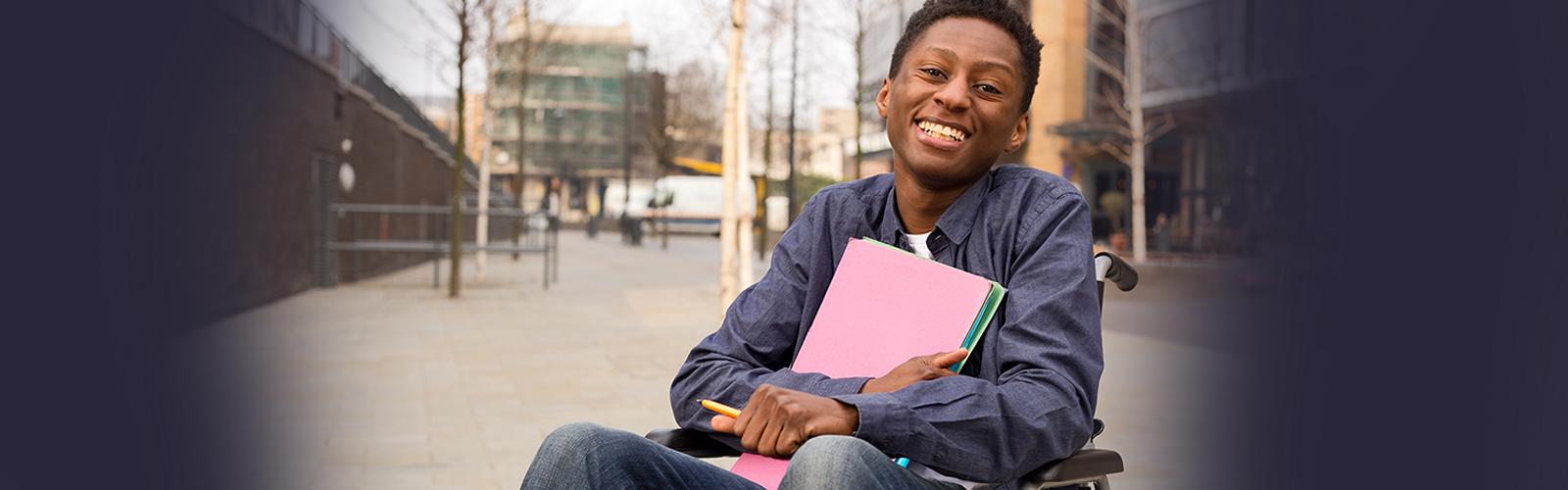 smiling African American student in wheelchair