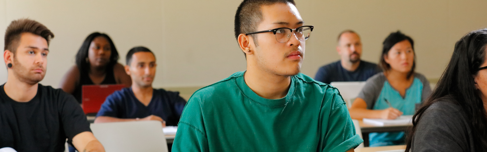 Image of students in a classroom paying attention