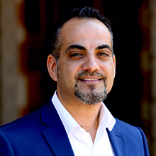 Headshot of Ben Reynoso